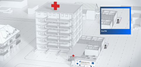 View of a hospital – a Riedel Kooling truck is parked in front of the building, and a Kool°M chiller for an MRI machine is being installed behind the building.